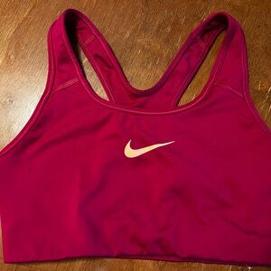 EUC Fuchsia with peach swoosh Nike sports bra